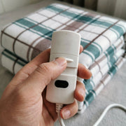 Electric Heated Blanket – controller in hand